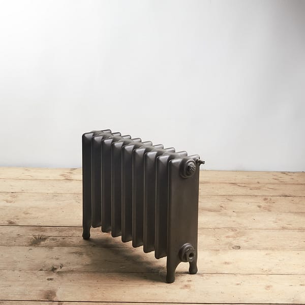 Small solid fin cast iron radiator