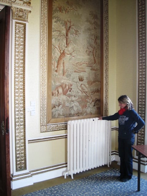 Very tall traditional radiator in grand setting