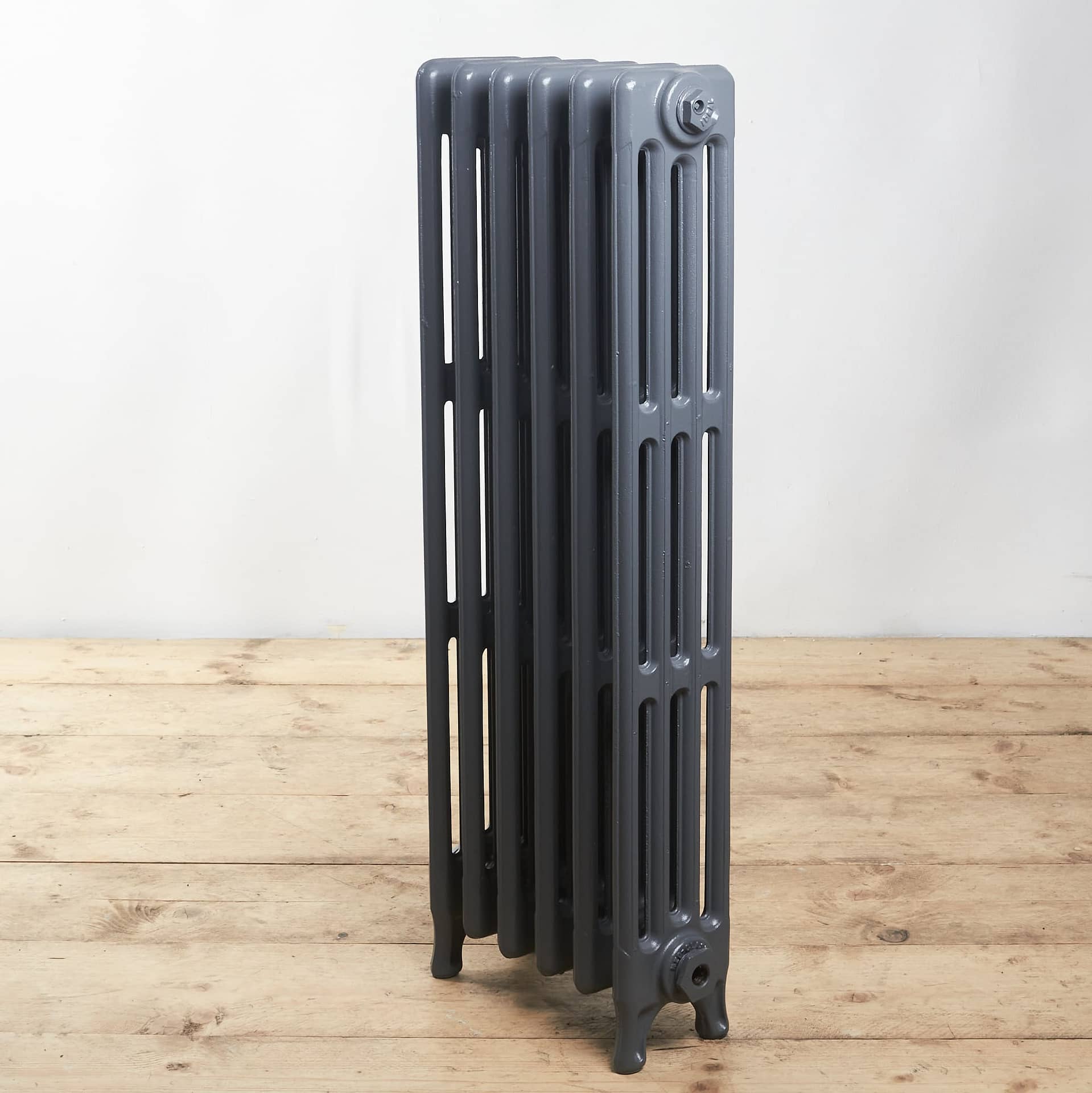 Grey four column radiator