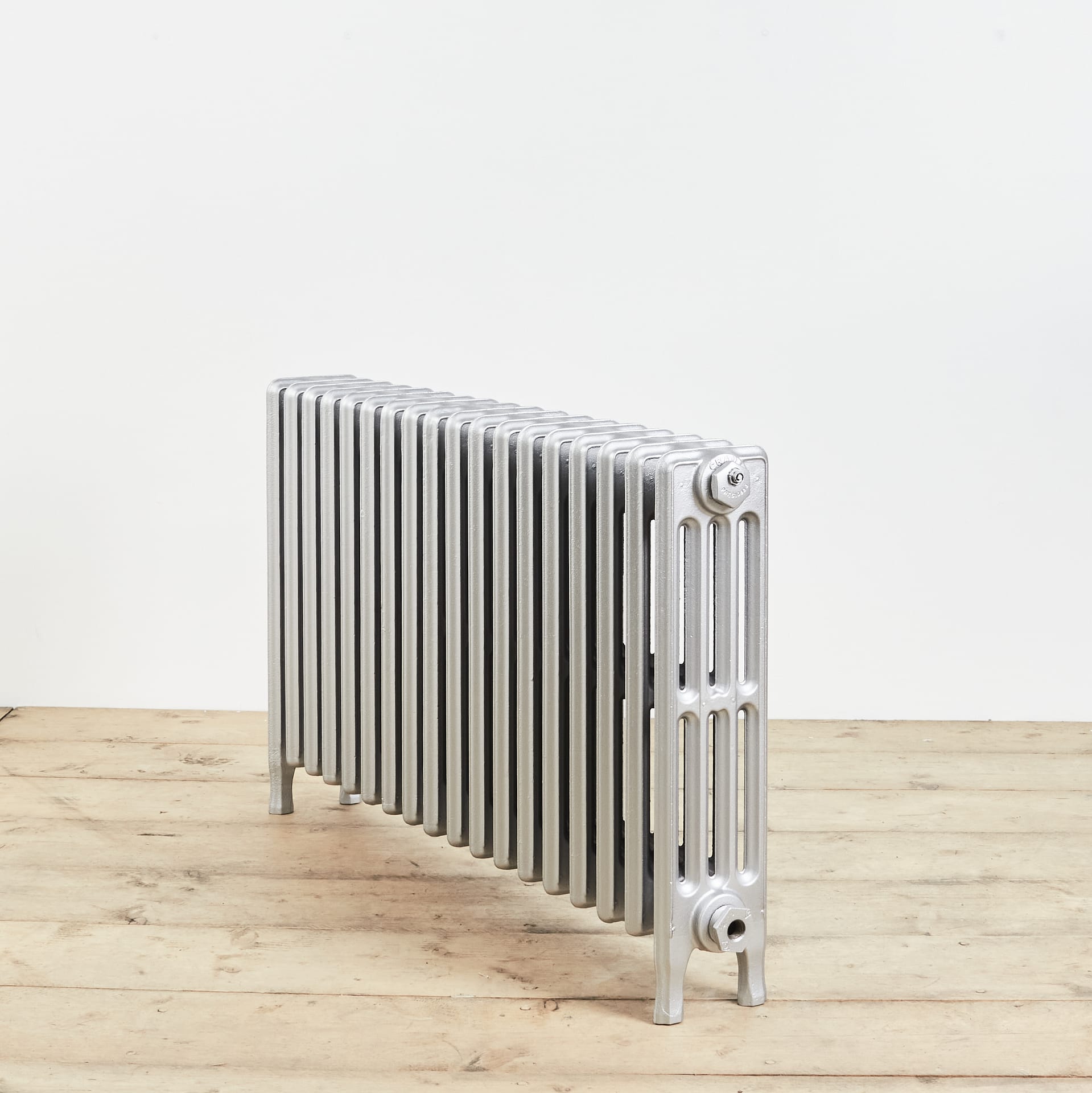 Silver columned cast iron radiator