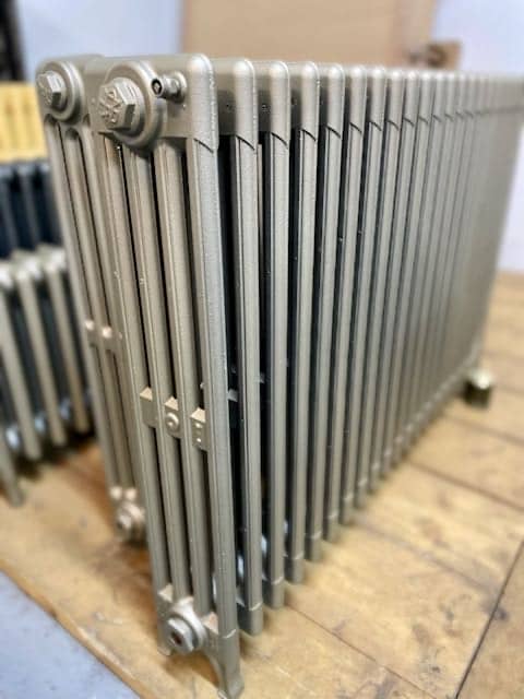 Reconditioned cast iron radiators in platinum painted finish