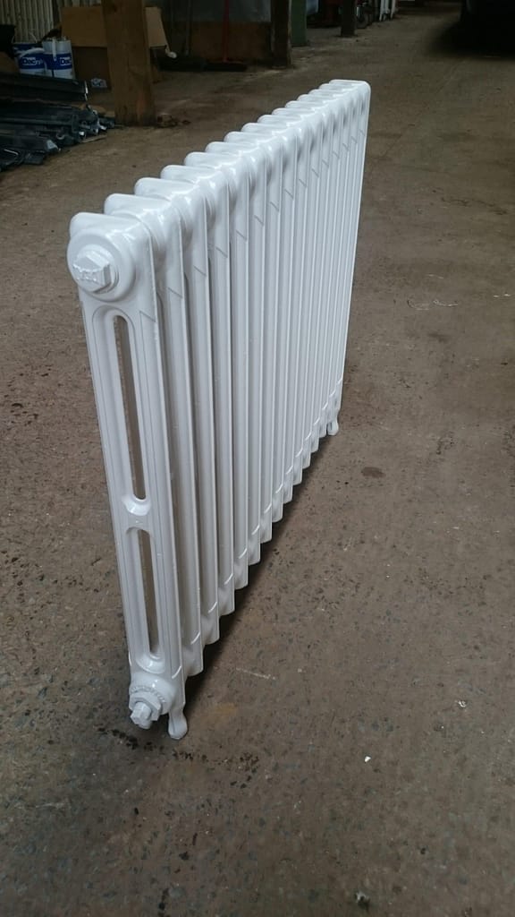 Repaired painted cast iron slim radiator